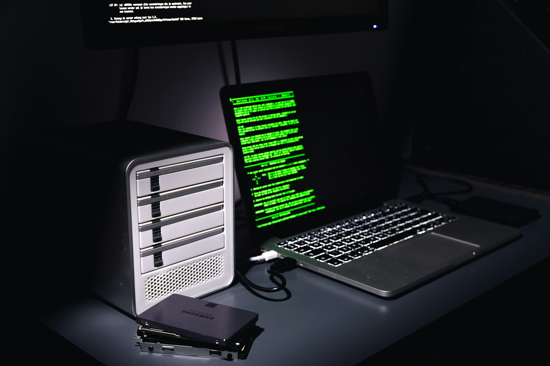AI scam and cybersecurity statistics — laptop displaying security code